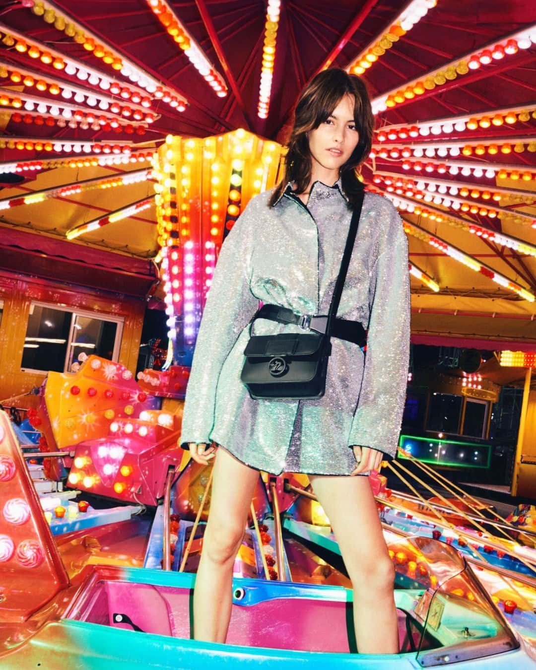 Longchampのインスタグラム：「Join the party.  Collection: #ParisIsAParty  Bag: #LongchampBoxTrot  Photographer: Matteo Montanari  Stylist: @norabordjah  Model: @lotte.klh Hair: @chiwonghair  Make-up artist: @adrienpinault   #Longchamp #Parisisaparty #endoftheyear #newcollection #LongchampSS24 #christmas #christmasoutfit #newyear2024 #newyearoutfit #party #giftideas #blackbag #leatherbag #crossbodybag #longchampbag #partyvibes」