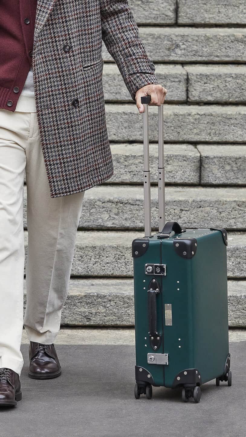 インコテックスのインスタグラム：「DISCOVER THE NEW SUITCASE BY SLOWEAR & GLOBE TROTTER.  The classic Globe-Trotter model has been simplified and reduced to its essence. On the outside, a shell made of 14 layers of recycled paper specially treated. On the inside, a soft and luxurious Alcantara®️ coating.  In addition, you will have the opportunity to make your luggage even more unique and exclusive thanks to a LUXURIOUS PERSONALISATION OF THE FRONT WITH YOUR INITIALS.  Find out more (link in bio).  #Incotex #DurableFashion #SlowearVenezia . . #FallWinterCollection #FW23 #newcollection #durablefashion #sustainablefashion #slowfashion #sustainableclothing #eticalclothing #fashionman #fashion #style #man #outfitforman #model #smartcasualcollection #leisurewear」