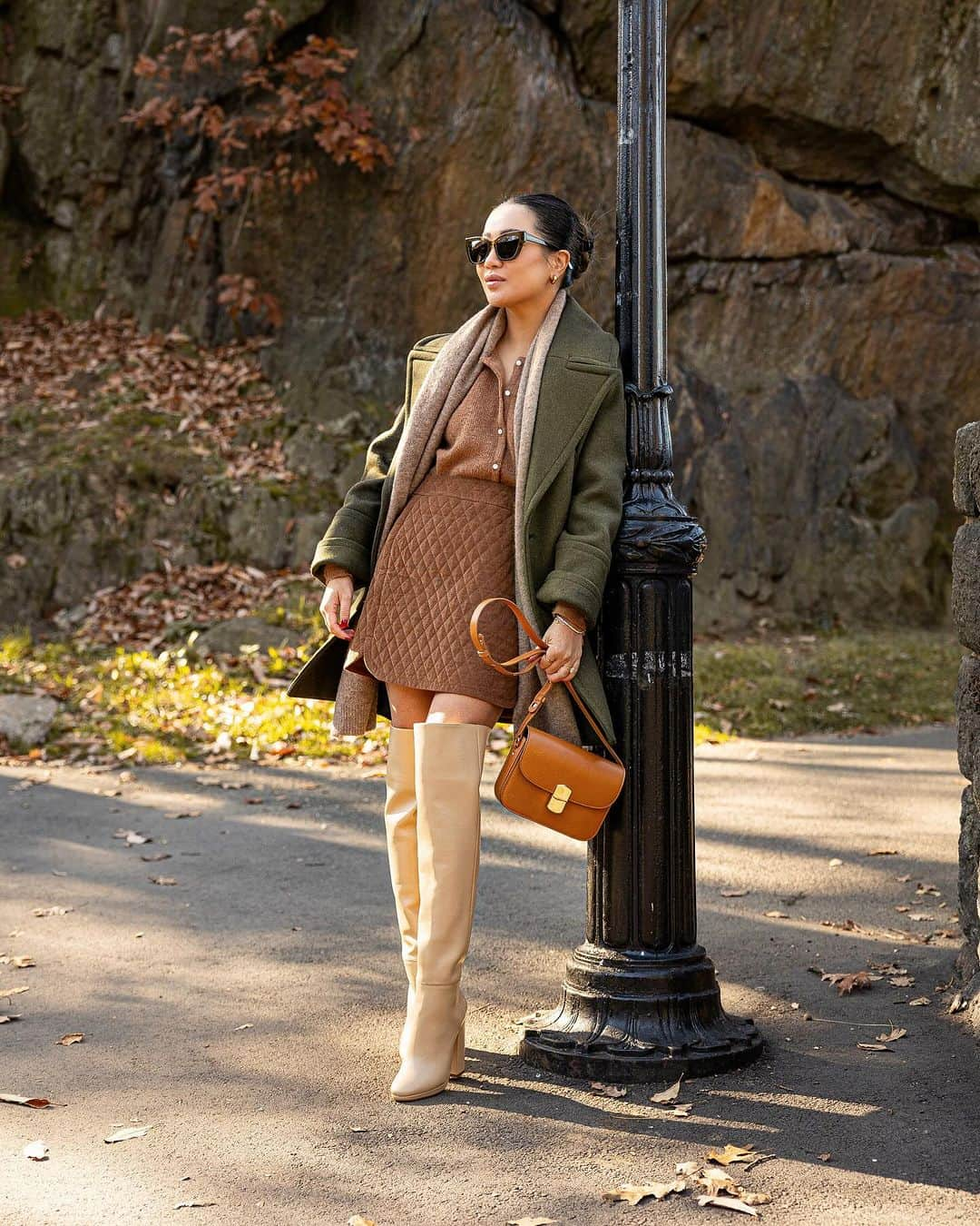 ウェンディー・グエンのインスタグラム：「A fall palette 🍁🍂 Loving this combo - green pea coat + velvet quilted skirt + sand color boots 🤎 A gorgeous symphony of lush textures and warmth. If you love any of these pieces, comment with ‘LINKS’ and I’ll DM you links to them. His and Hers in our favorite @sezane & @octobre_editions 🍂 #sezane #sezanepartner #sezanelovers」