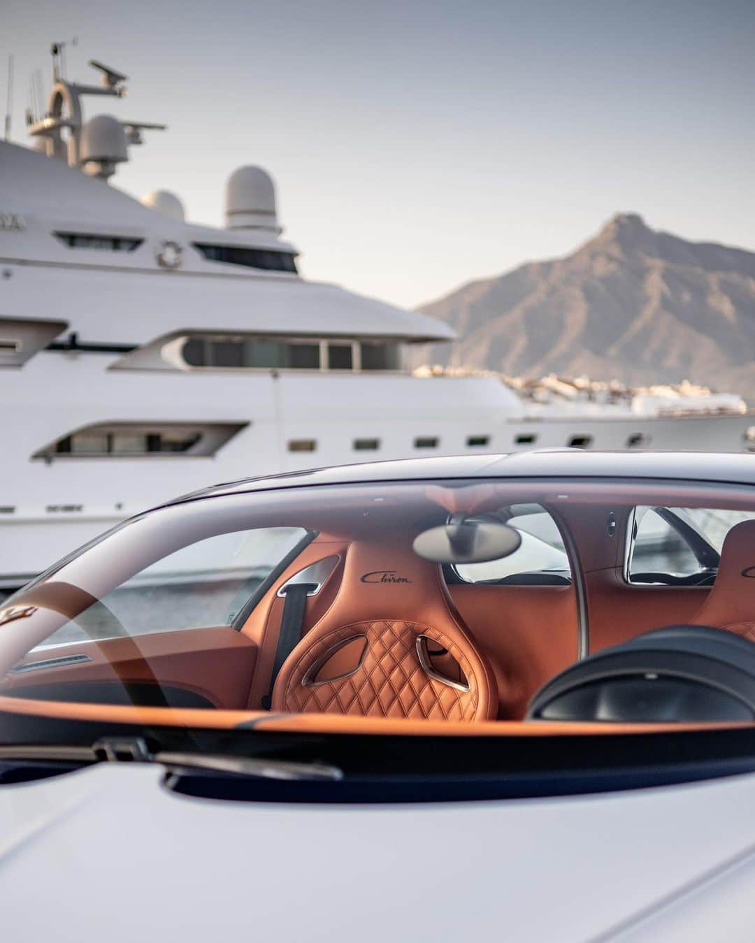 ブガッティさんのインスタグラム写真 - (ブガッティInstagram)「Innovative technology, sophisticated design and exquisite comfort, the CHIRON pushes the boundaries of what is possible. From the marina in Puerto Banús to the coastal roads of Andalusia, BUGATTI effortlessly blends luxury and performance.   #BUGATTI #CHIRON captured by: @zulaw.ski – WLTP: bugatti.link/consumption」11月25日 22時00分 - bugatti