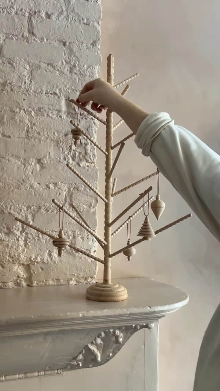 etsyのインスタグラム：「This weekend, it’s us and the tinsel 🎄 Wooden Tree by @tahni.in」