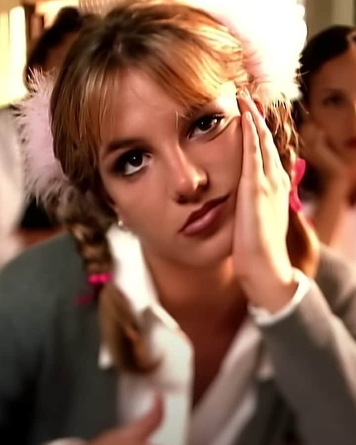 E! Onlineのインスタグラム：「We must confess we still think about this iconic music video all the time. 💕 Link in bio for BTS secrets about Britney Spears' #BabyOneMoreTime. (📷: Baby One More Time Music Video)」