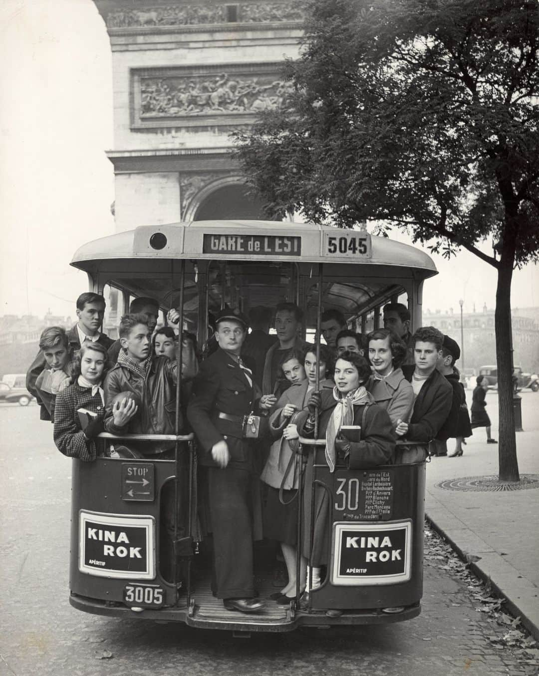 lifeのインスタグラム：「Group of American teenagers riding on a streetcar towards the Arc de Triomphe as they head home from Saturday afternoon football game, Paris - 1952.   (📷 Gordon Parks/LIFE Picture Collection)   #LIFEMagazine #LIFEArchive #LIFEPictureCollection #GordonParks #Paris #France #Teenagers #StreetCar #1950s」