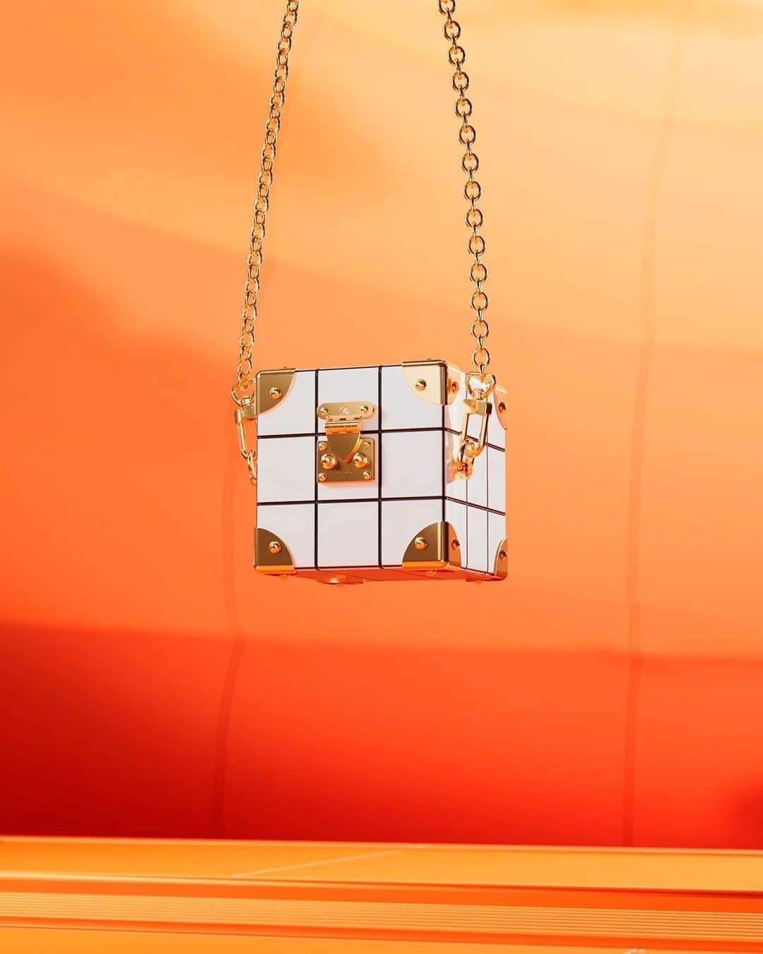 ルイ・ヴィトンのインスタグラム：「VIA Tile Trunk by Nicolas Ghesquière. The Maison uncovers a new collectible with the VIA Tile Trunk by @NicolasGhesquiere, an ode to the heritage Damier motif. Echoing Louis Vuitton's voyage into digital craftsmanship, the pixelated cube embodies a contemporary allure. Discover more via link in bio.  The collectible is available now, exclusively for VIA Treasure Trunk owners.  Transferable digital collectible. Limited edition. Physical Claim: February 2024.  #LouisVuitton #LouisVuittonVIA」