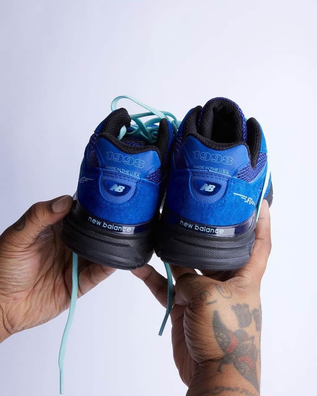 HYPEBEASTさんのインスタグラム写真 - (HYPEBEASTInstagram)「@joefreshgoods has officially unveiled his next @newbalance project arriving in the form of three 990v4s inspired by Hype Williams' film "Belly."⁠ ⁠ The three sneakers in the pack are appropriately named "OUTRO" (Black), "INTRO" (White), and "KEISHA BLUE" [aying homage to the 1998 film. Other details include the year hit found at the heel paired with "JFG" branding on the lateral side. ⁠ ⁠ The last slide showcases campaign imagery inspired by an 'XXL' cover from June 1999 which featured Jay Z, DMX, and Ja Rule. The sneakers will be accompanied by apparel to bring together the overall collection.⁠ Photo: Joe Freshgoods」11月28日 6時01分 - hypebeast