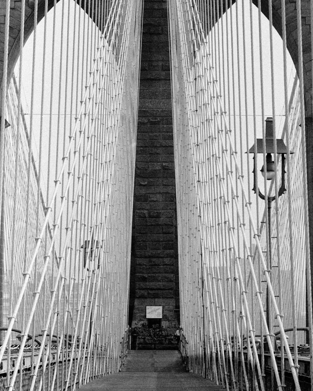 lifeのインスタグラム：「Photo showing the pedestrian walkway on the Brooklyn Bridge - New York, 1983.   Purchase this photo as a print by clicking the link in our bio! 🏙️  (📷 Alfred Eisenstaedt/LIFE Picture Collection)   #LIFEMagazine #LIFEArchive #LIFEPictureCollection #AlfredEisenstaedt #BrooklynBridge #NYC #NewYork #1980s #Landmark」