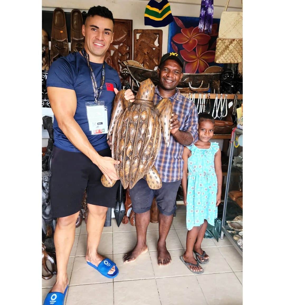 ピッタ・タウファトフアのインスタグラム：「Funny story, Picked up this beautiful Turtle to support the local handicraft vendors here in the Solomon Islands. One of the most unique hand carvings I've ever seen, made  from  Cordia wood with beautiful detail. Part of the fun is the negotiation process which I actually enjoy ( don't worry I went extremely easy 😉)  I did however end up losing some of my Olympic and games gear in the deal which he was extremely thankful for, all part of the fun !  The carver hit me with a one-two combo by asking for a picture with all of us amd with his young daughter.   We went back to the hotel to get the cash for the Turtle  while he organised the quarantine approval. What he doesn't know yet is that thanks to coach Paul and his Daughter Angel's suggestion we were able to get out some extra cash to help pay for his daughters school fees for a year or two. ( Not assuming for a second he can't or doesn't  do this himself) we just know how hard life can be in the Pacific!  So tomorrow we will pick up this beautiful Turtle and hopefully surprise him with a little extra schooling donation. Thank you to @angel_s.tapa and @master_sitapa for helping out. Will keep you all updated and if you ever get the chance, the handicrafts in solomon Islands are second to none.  Looking forward to my new coffee table centre piece !」