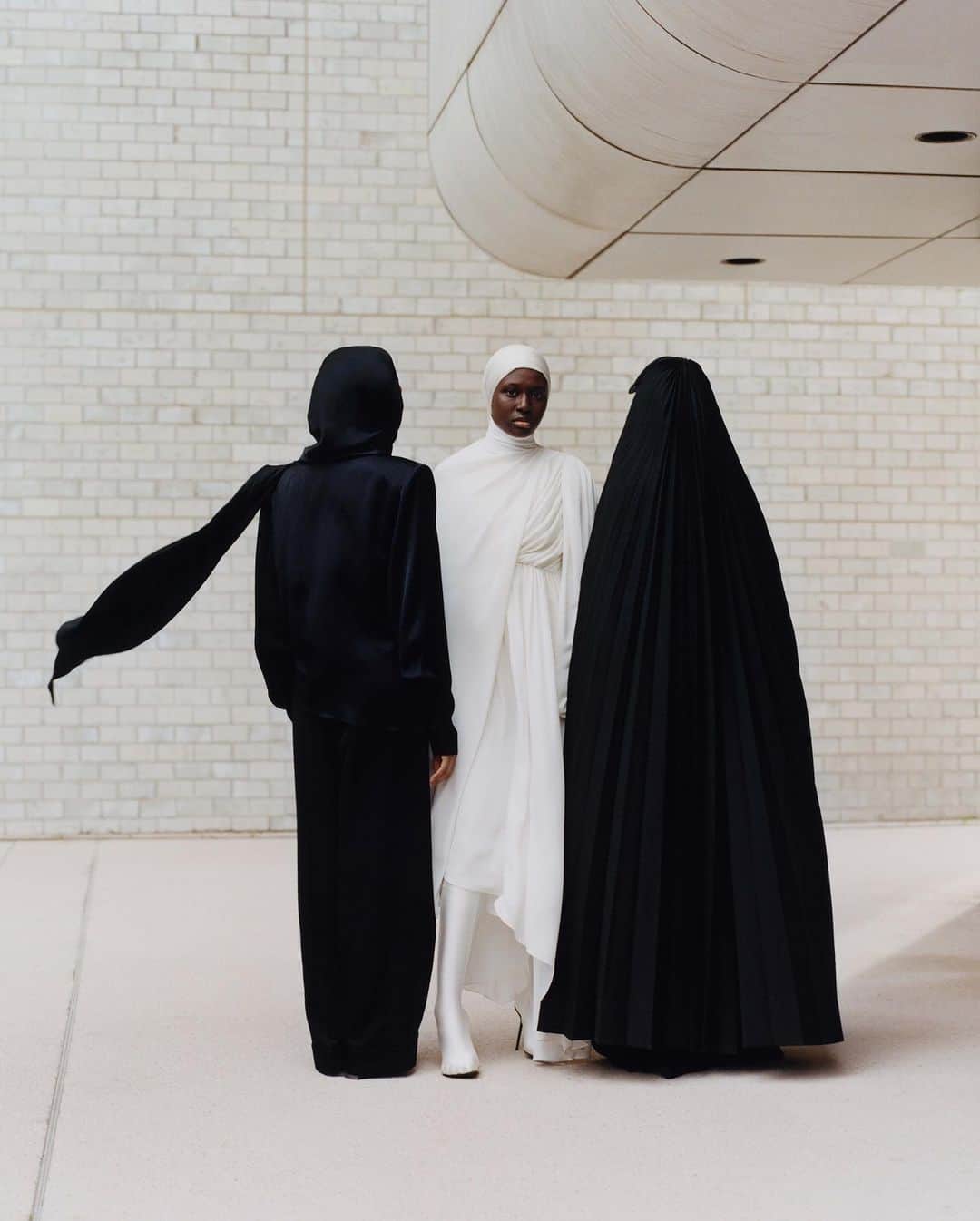 Dazed Magazineさんのインスタグラム写真 - (Dazed MagazineInstagram)「The French state’s efforts to defend women’s rights and prevent ‘separatism’ while further entrenching the ban on the hijab and other religiously affiliated clothing, are entirely self-defeating. All credit is due to the Muslim women and girls who have chosen to stake their own claim to Frenchness 🙌  “The media talks about the hijab all the time. It’s broadcasting news all day, often platforming the extreme right. There’s not a single day you don’t hear about Arabs, Muslims or immigrants on the news. But the media is portraying a version of us that doesn’t exist.” — Salimata Sylla   “We’re still going to fight, we’re not going to let it go. We have more and more girls that join us every day. This is just the beginning.”   Tap the link in bio to explore more 🔗  Featuring Founé Diawara, Hawa Doucouré, and Yousra of @leshijabeuses, Salimata Sylla @sali_7, Loubna Reguig loubnarchives, Ania Khelaf @ania.tayri, Sarah B @saraahh.bni, Hiba Latreche @hibalat  Photography @gunsahma Styling @omaimasss Hair @oummy_youssoufa Make-up @minkimmakeup Production @wagmbh Post Production @_thehandofgod  Text @tiara.sahar  Editor-in-Chief @ibkamara Art Director @gareth_wrighton Editorial Director @kaci0n Fashion Director @imruh  1. Ania wears gabardine dress and leather pumps @prada, cotton bodysuit worn underneath @wolford. 2. From left: Salimata wears technical moiré coat @dior, cotton bodysuit worn underneath @wolford. Loubna wears all clothes @maisonalaia. Hiba wears scuba and silk dress @gucci, hooded top worn underneath @marineserre_official. 3. Founé wears technical silk dress @balenciaga. 4. Sarah wears spandex dress @maisonjsimone. 5. Hawa wears silk top @ysl by @anthonyvaccarello. 6. From left: Hawa wears all clothes @ysl by @anthonyvaccarello. Founé wears technical silk dress, spandex panta-boots @balenciaga. Yousra wears recycled polyester dress @cfcl_official, cotton bodysuit worn underneath @wolford, wool pleated Burça @burcakyol. 7. Founé wears technical silk dress @balenciaga. 8. Hawa wears all clothes @ysl by @anthonyvaccarello. 9. Hiba wears hooded top @marineserre_official.  Taken from the winter 2023 #THEBADDIEISSUE of #Dazed」11月29日 22時04分 - dazed