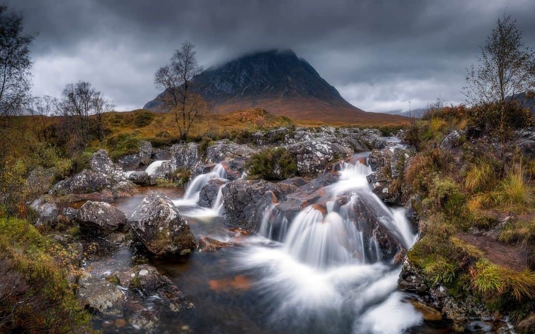 Fujifilm UKのインスタグラム：「“Buachaille Etive Mòr, a mountain at the head of Glen Etive, which can be seen from the A82 road. It’s one of the most recognisable sights in the area. There are images of nearby flowing waters with the mountain as a backdrop everywhere.   “It has to be one of the most photographed spots in Scotland and it’s easy to see why. Better yet, if you get there early in the morning, you’ll find deer wandering the landscape, which provide another beautiful detail to any scene.” ⛰   📸: FUJIFILM X Photographer @emily_endean_photography  #FUJIFILMXT3 XF14mmF2.8 R f/10, ISO 80, 2 sec.」