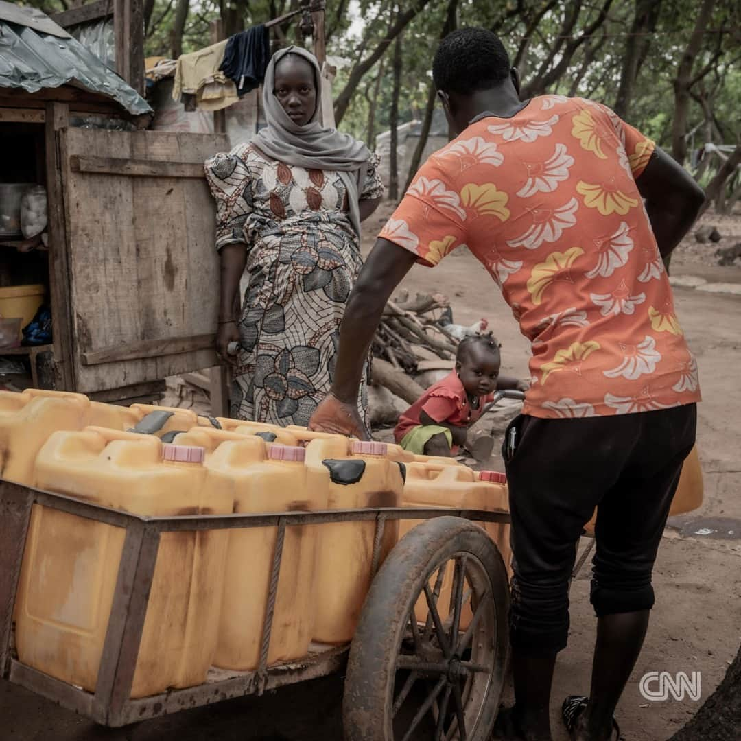 CNNさんのインスタグラム写真 - (CNNInstagram)「Aisha Aliyu is eight months pregnant and sprawled out on a mat in front of her house with four of her children spread around her feet. Two-year-old Hauwa and five-year-old Abba are both crying and tugging at their mother's hijab. She, in response, rolls her eyes and clicks her tongue at them. She looks tired.  The child Aliyu is carrying is her tenth. The last four were delivered in the Durumi Camp, a place in Nigeria's capital city, Abuja, that she and an estimated more than 3,000 other internally displaced people call home.  In 2013, Aliyu fled her home in the village of Wala in Nigeria's northeastern Borno State to its capital, Maiduguri. She said her village was attacked and much of it burned down by armed Islamist group, Boko Haram. Two years later, the militant group attacked Maiduguri, forcing Aliyu to again migrate, this time travelling over 856km south to Abuja with her husband and five children.  The now 39-year-old saw having many children as a way of replacing her relatives killed by the insurgents, but reveals she was done after her last pregnancy in 2021 and began using contraceptives. However, she became pregnant again this year.  Aliyu is one of many internally displaced women bearing children in Nigeria's camps, with some grounds not even housing a health post or shelter for birth, instead needing women to go into labor in their own shelters or that of their birth attendant.  Tap the link in bio for more.   📸 : Taibat Ajiboye for CNN  1. Aisha Aliyu. 2. The nurse takes the weight of the pregnant women during antenatal. 3. The camp nurse, Isa Umar examines a pregnant woman during antenatal session. 4. With Aisha almost full term, she is no longer able to go to fetch water and now has to pay up to N500 daily for it to be delivered to her home. 5. The makeshift delivery room partitioned in the shipping container used as the camp's health post. 6. A volunteer doctor brought his own kit to do blood tests at the Durumi camp. 7. Aisha with five of her children.」11月30日 1時08分 - cnn