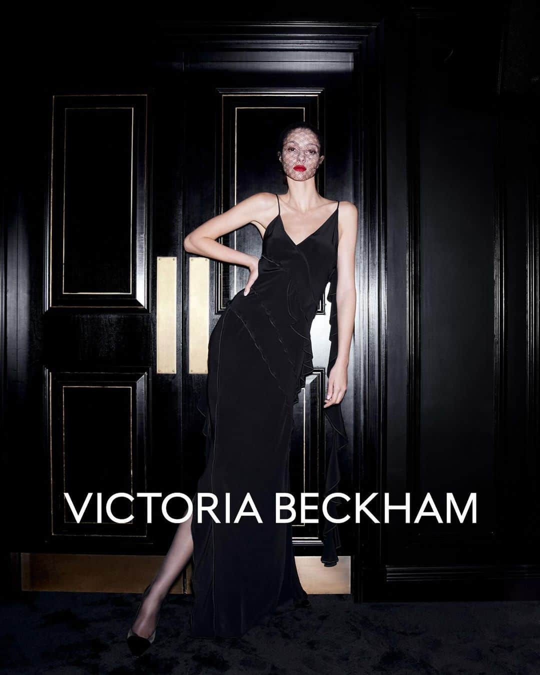 ヴィクトリアベッカムのインスタグラム：「AVAILABLE NOW!  Romantic ruffles add a contemporary attitude to effortless gowns.   Shop the exclusive Asymmetric Frill Dress in black at VictoriaBeckham.com and at 36 Dover Street.」