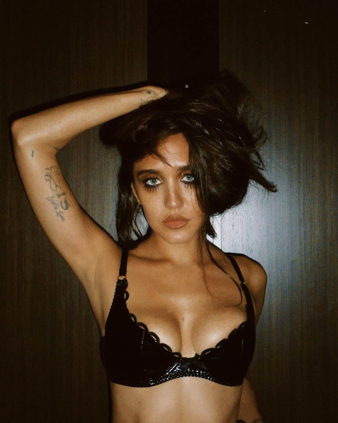 Agent Provocateurのインスタグラム：「Lashes & Lingerie  Vamp queen @jessejostark serves midnight glamour in the Zarya bra.  Zarya is good lingerie for bad girls: cause drama in kink-luxe PVC and pretty scallop edging.  Tap to explore Zarya.  #KnickersForever #AgentProvocateur」