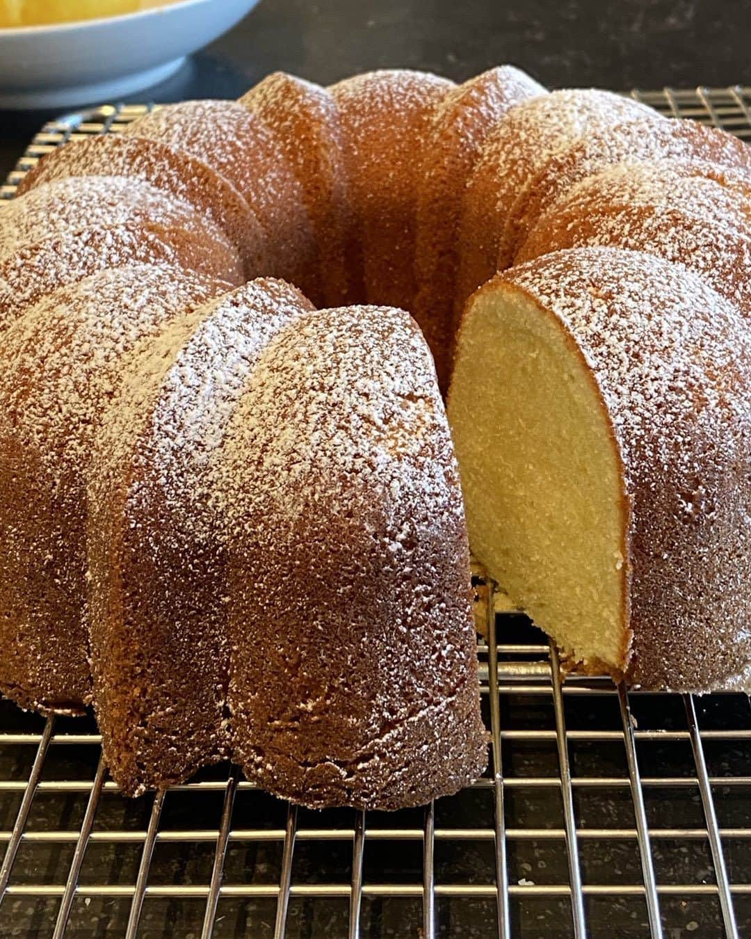 アイナ・ガーテンのインスタグラム：「My endless testing in search of the best vanilla pound cake.  I can't decide if it should have this dusting of confectioners' sugar or a drizzle.  What do you think??」