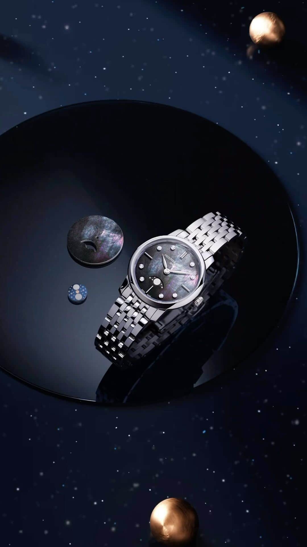 フレデリックコンスタントのインスタグラム：「For women who dream big but keep their feet firmly on the ground, the Classics Slimline Ladies features a Moon Phase on a starry, mother-of-pearl backdrop – stellar elegance on the wrist.   #CelebrateYourPassion #Gift #HolidaySeason #ClassicsCollection #LadiesWatch」