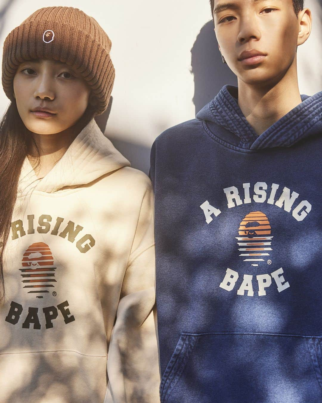 ア ベイシング エイプさんのインスタグラム写真 - (ア ベイシング エイプInstagram)「A BATHING APE® is launching a new collection "A RISING BAPE®" inspired by Asia.   This collection features a bi-colored APE HEAD with a "sunrise" motif in a college logo graphic. The collection includes a line-up of T-shirts, hoodies, and sweatpants.  The visuals were shot in Tokyo at sunrise to match the concept of the collection.  This collection will be available in limited quantities at authorized A BATHING APE® stores and BAPE.COM on December 2nd, 2023. In addition, the Hanten Jacket featured in the LOOK will be available in black and brown colorways which is scheduled to release in January 2024.   #bape #abathingape #ARISINGBAPE」12月1日 12時00分 - bape_japan