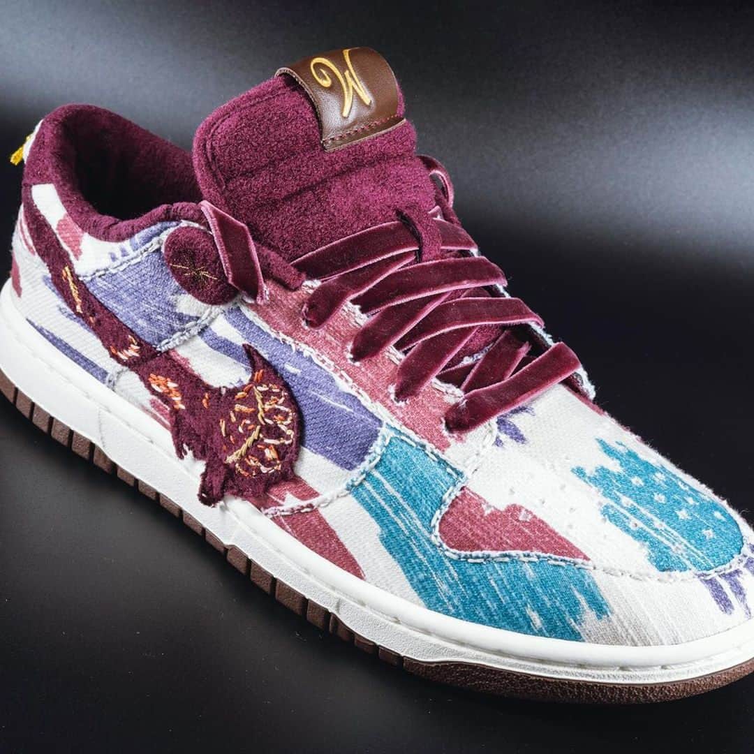 HYPEBEASTのインスタグラム：「It's not a golden ticket, but @tchalamet and @wbpictures are giving away an ultra-rare pair of @nike Dunk Lows in honor of the upcoming film, @wonkamovie.⁠ ⁠ Limited to only five pairs, the shoe’s upper is adorned with Willy Wonka’s signature color palette. The special iteration is crafted with a white canvas base heavily contrasted by stripes of light blue, burgundy, and purple. From there, a deep burgundy hue, which matches Wonka’s coat, lands on the textured panel Swoosh that features embroidered detailing, as well as on the sock lining, heel, and velvet tongue. ⁠ ⁠ Moreover, a unique, leather tongue tag in chocolate brown sports the chocolate factory owner's “W” emblem while the heel logo is switched out from the traditional Nike trademark to an embroidered 3D cloud and thunder.⁠ ⁠ Fans can try their luck by participating in a giveaway that requires a one-minute video showcasing their work that’s inspired by the eccentric character. 'Wonka hits' US theaters on December 15.⁠ Photo: Complex」