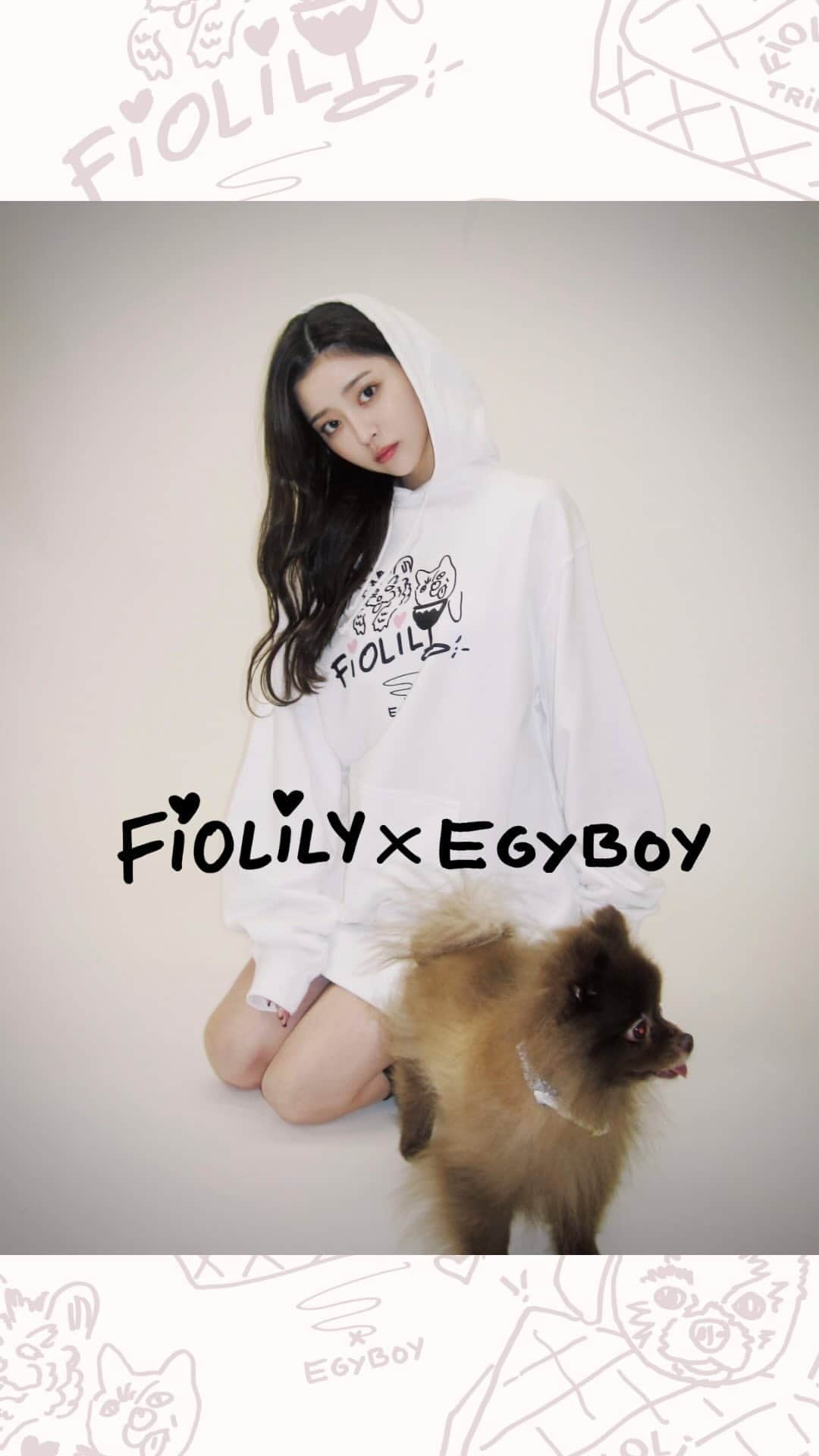 山本月のインスタグラム：「念願のコラボ発売しました🩷🎉  @fiolily_official × @egyboy_art_cowboy ✌️  @fiolily_official のアカウントに『エギー』とDMするだけで3日限定の10%OFFクーポン(EGYコラボアイテム対象)が届きます💌  ヨーロッパの有名イラストレーターEGYに書き下ろしてもらったオリジナルプリントアイテムたち🥺🩷 愛する愛犬の @titi.1214 @chachaa.1022 をモデルにしたユーモラスでキャッチーなイラストどれも可愛いから是非GETしてね🫶  #fiolily #egyboy #フィオリリー #エギーボーイ」