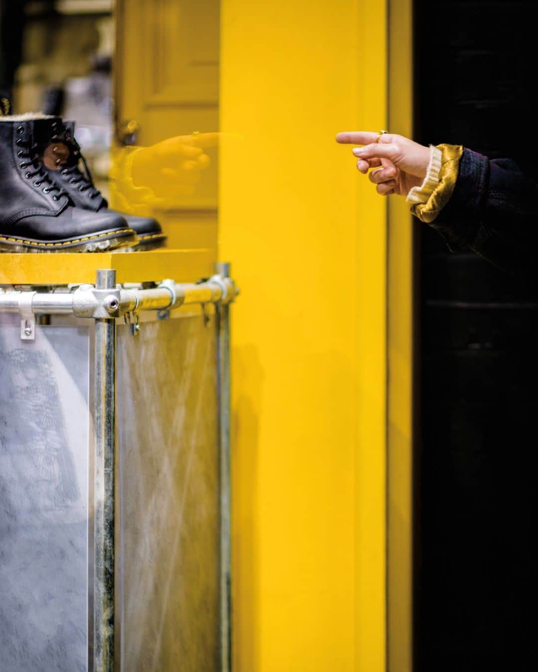 Fujifilm UKのインスタグラム：「Window shopper.  “This photo was shot on a winter evening and I was initially drawn to the beautifully lit bright yellow shopfront. I was using the XF56mmF1.2 and caught this shopper’s hand pointing at the pair of boots. I like how we only see the details and have to imagine the rest of the story for ourselves.”   📷: @shorty.shots  #FUJIFILMXT3 XF56mmF1.2 R f/1.2, ISO 160, 1/220 sec. 🎞 Pro Neg Hi V2」