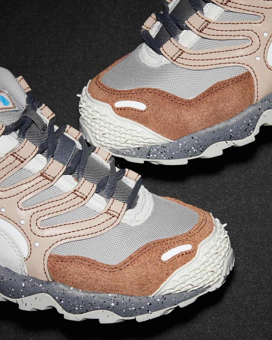 UNDFTDさんのインスタグラム写真 - (UNDFTDInstagram)「UNDEFEATED x Nike Air Terra Humara ‘Archaeo Brown’  Expanding on their long-standing partnership, UNDEFEATED and Nike teamed up in reworking two new iterations of the Air Terra Humara. Both colorways boast a reflective cage that houses a nubuck suede and ballistic cordura upper, sitting atop a speckled rubber midsole, outsole and air bag cage.   Subtle details compliment the shoe’s unique design - the debossed ‘Play Dirty’ lettering split across the medial and lateral sides of the shoe, along with reflective silver elements, the UNDFTD flag label attached to the matte leather Swoosh and a custom graphic sock liner.  Both pairs include an extra set of speckled laces and a custom 5-strike logo reimagined from the original Nike trail branding, a unique logo that appears as a woven label on the tongue and heel and is also showcased on the custom shoe box.  UNDEFEATED Exclusive  The UNDEFEATED x Nike Air Terra Humara in ‘Black’ and ‘Archaeo Brown’ will be available on Saturday, 12/2, exclusively at all UNDEFEATED Chapter Stores globally and Undefeated.com at 8am PST.  Shipping internationally, excluding Korea」12月2日 10時01分 - undefeatedinc