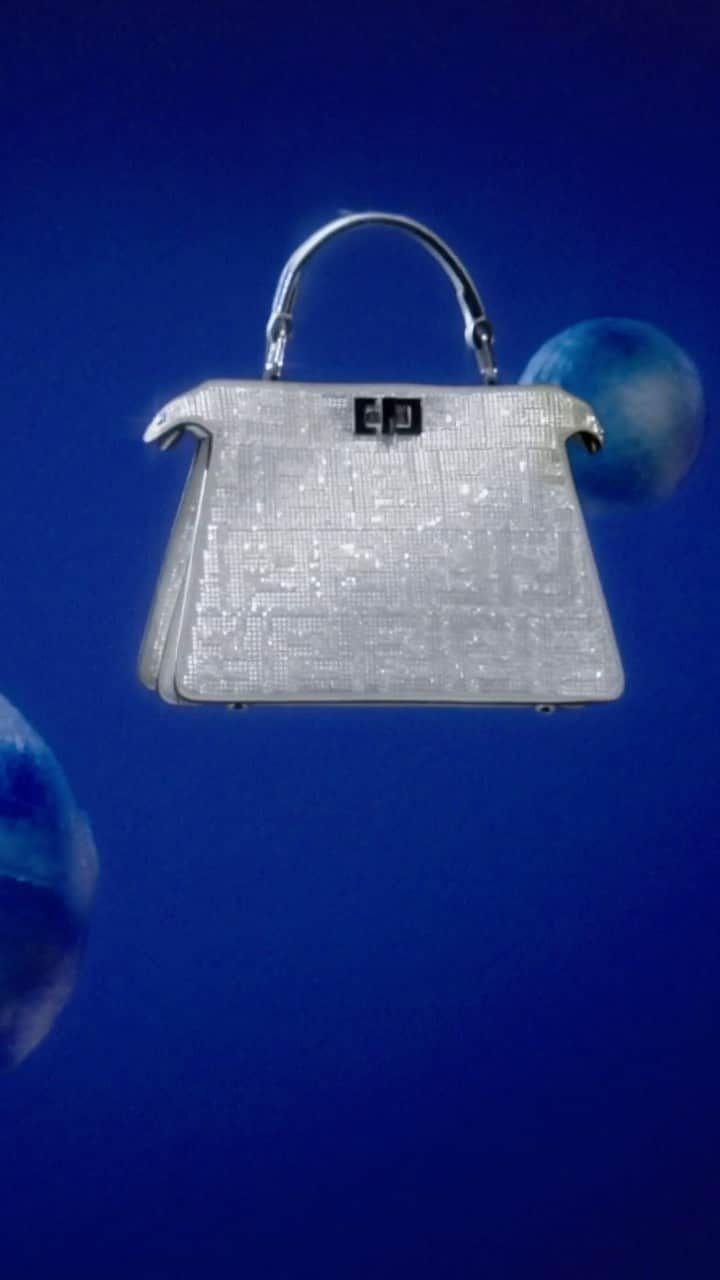 Fendiのインスタグラム：「Multifaceted crystals reflect the brilliance of the season in a special iteration of the iconic #FendiPeekaboo.  Shop #FendiGifts in boutiques and at the link in bio.  Direction: @_miloreid_ Set Design: @tilly_power34」