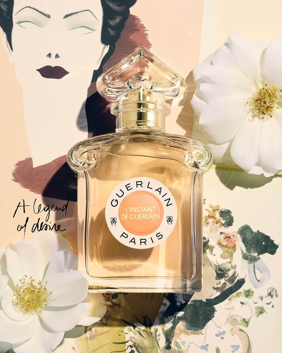 ゲランのインスタグラム：「L’Instant de Guerlain, a legend of love’s desire.  A sunny day, on the verge of a new century brimming with light and hope… an instant in time. Velvety rich yet light as air, L’Instant de Guerlain envelops Guerlain’s famous Guerlinade in honey, magnolia, and sensual amber - a fragrance for a world freed, fleetingly, from social convention.  — #GuerlainPerfume #PerfumerSince1828 #LesLegendaires #VintagePerfume #Amber #Fragrance #SavoirFaire #IconicFragrance」