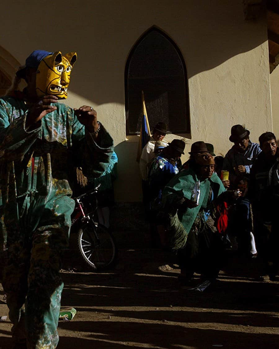 thephotosocietyさんのインスタグラム写真 - (thephotosocietyInstagram)「Photo by @ivankphoto | A man wears a jaguar mask during a Christmas fiesta near Zumbahua, Ecuador, on December 25, 2004. During the fiesta, some wear masks representing different animals as they dance and play-fight.」12月3日 13時09分 - thephotosociety