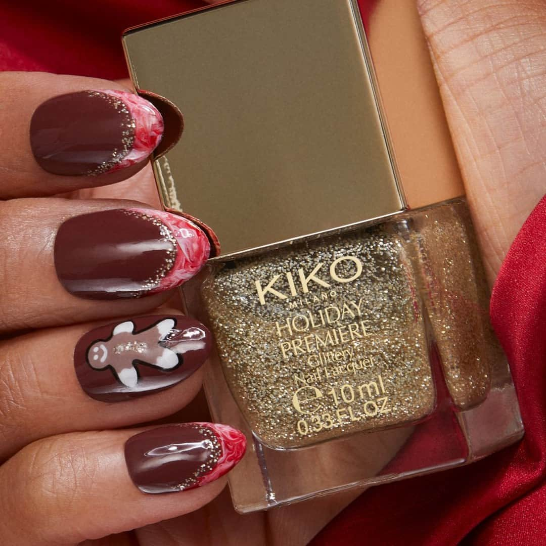 KIKO MILANOさんのインスタグラム写真 - (KIKO MILANOInstagram)「We can't resist the cuteness of this festive #nailart! 💅😍 Recreate this delightful look with our extensive range of nail polishes and add a touch of shimmer with our #KIKOHolidayPremiere Glitter Nail Lacquer! Who’s trying this? ⁣ ⁣ #KIKONails #nailart #cutenails #nailartinspo #festivenails⁣ ⁣ Holiday Première Glitter Nail Lacquer 01 - Smart Nail Lacquer 12, 41, 53, 101, 67⁣」12月4日 5時00分 - kikomilano