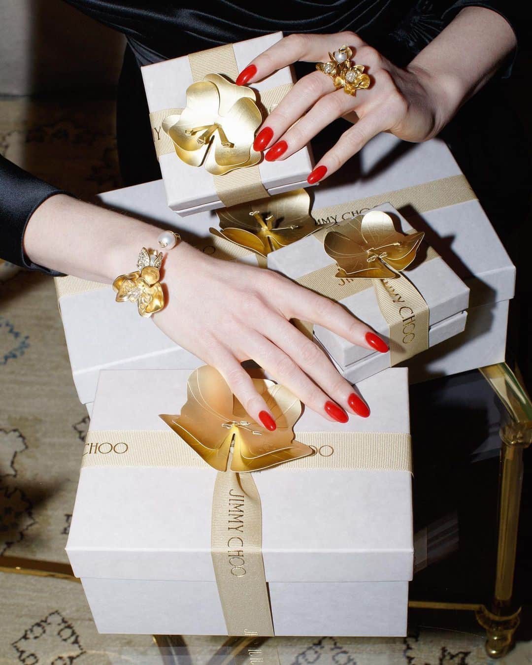 Jimmy Chooのインスタグラム：「Handcrafted with individually applied crystal and pearl details, this season's sculptural Petal Cuff and Petal Ring make the perfect gift from you, to you, this holiday season #JimmyChoo」