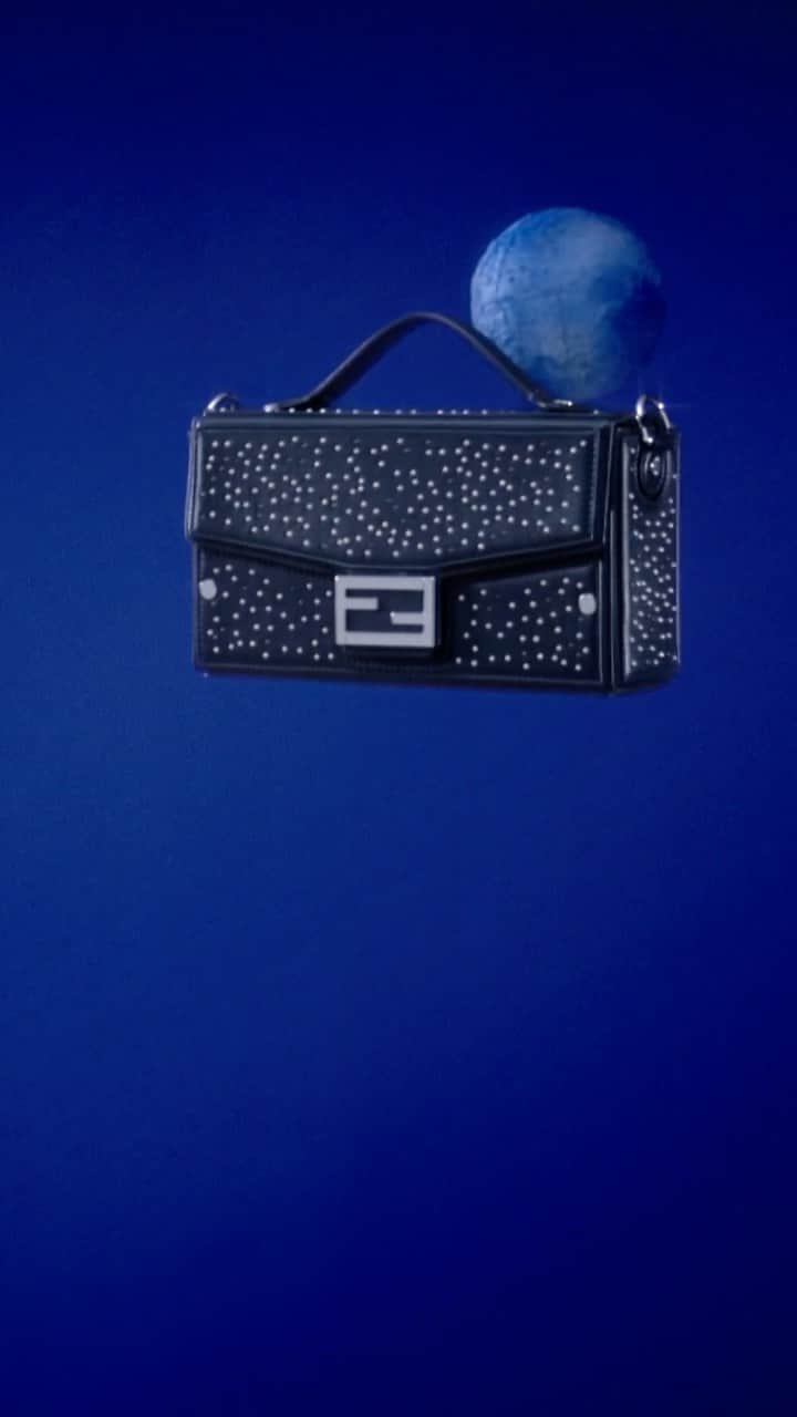 Fendiのインスタグラム：「From sparkling studs to timeless FF motifs, there’s an interpretation of the #FendiBaguette Soft Trunk for everyone on your list.  Shop #FendiGifts now in boutiques and at the link in bio.  Direction: @_miloreid_ Set Design: @tilly_power33」