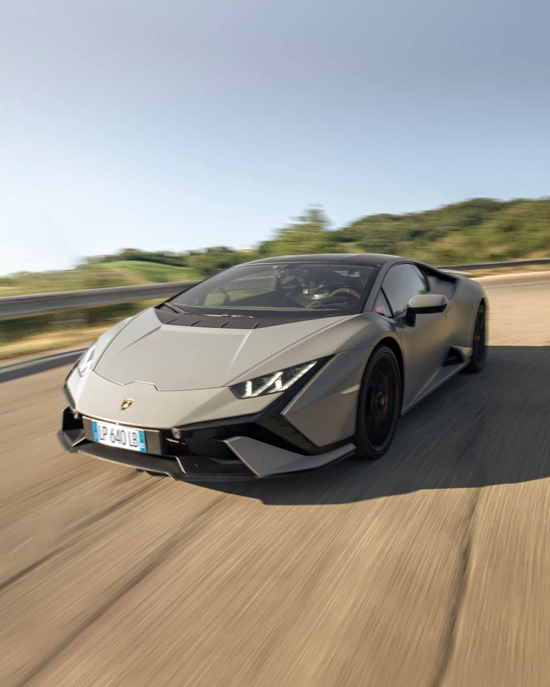 ランボルギーニのインスタグラム：「Which super sports car can transform any road into a playground? It’s Huracán Tecnica, born to bring out the mind and attitude of a pilot in every driver.  Captured by @worldstreetgraph   #Lamborghini #HuracanTecnica #TakeAllYourSoulsToDrive  __ Huracán Tecnica: fuel consumption combined: 14,5 l/100km (WLTP); CO2-emissions combined: 328 g/km (WLTP)」
