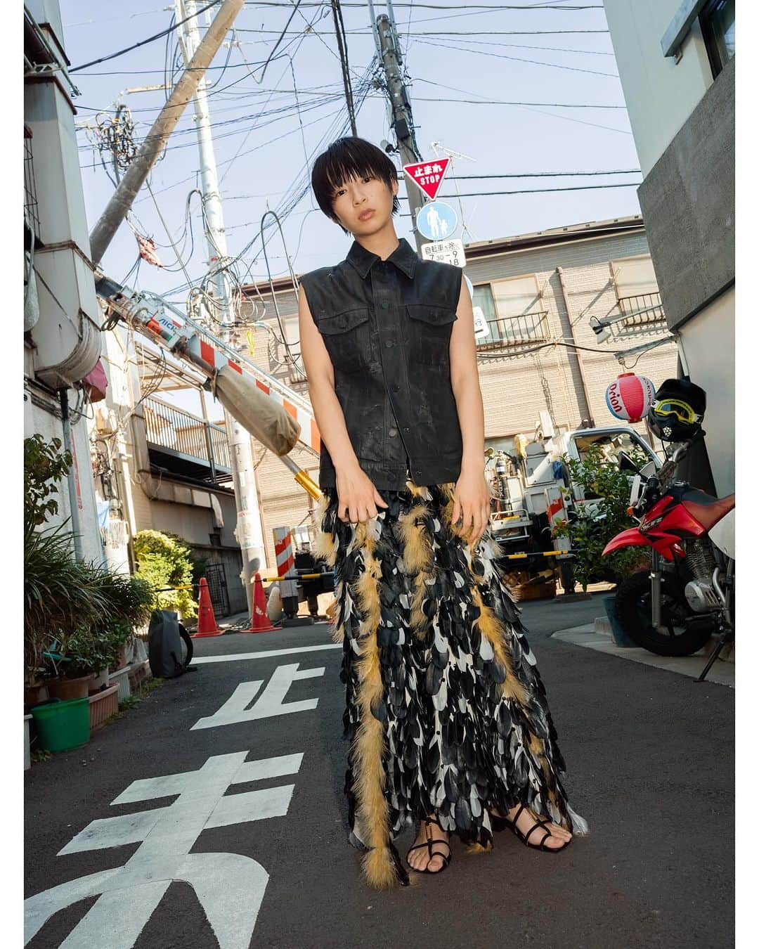 蓮井元彦のインスタグラム：「Odyssey in @theforumist staring @___rukaishikawa  styled by @_yosuke_shoji_  hair & makeup @misatoawaji  special thanks @flotsambooks  - Get ready to immerse yourself in a tale where fashion becomes a form of self-discovery, a narrative where the resonance of the soul leaves an indelible mark on the world of style. Welcome to a realm where substance and styling intersect, creating a symphony that resonates far beyond the surface, inviting you to ponder the profound connection between personal style and a philosophy that champions substance over extravagance. - 1,2 & 4) Denim Vest by Dior Homme by Hedi Slimane. Skirt by YUEQI QI. Sandals by Purpred. 3 & 8) Dress by PERMINUTE. Shoes by CAMPERLAB. 5 & 9) Dress by YUEQI QI. Spangle Dress by 1017 ALYX 9SM. Shoes by Purpred. 6) Vintage Nylon Jacket by NIKE. Dress, Skirt, and Pants by JICHOI®. Boots by YUEQI QI. 7) Top by NUMBER (N)INE by Takahiro Miyashita. Boots by CAMPER. Bracelet by LIMI Feu. Watch by G-SHOCK.」