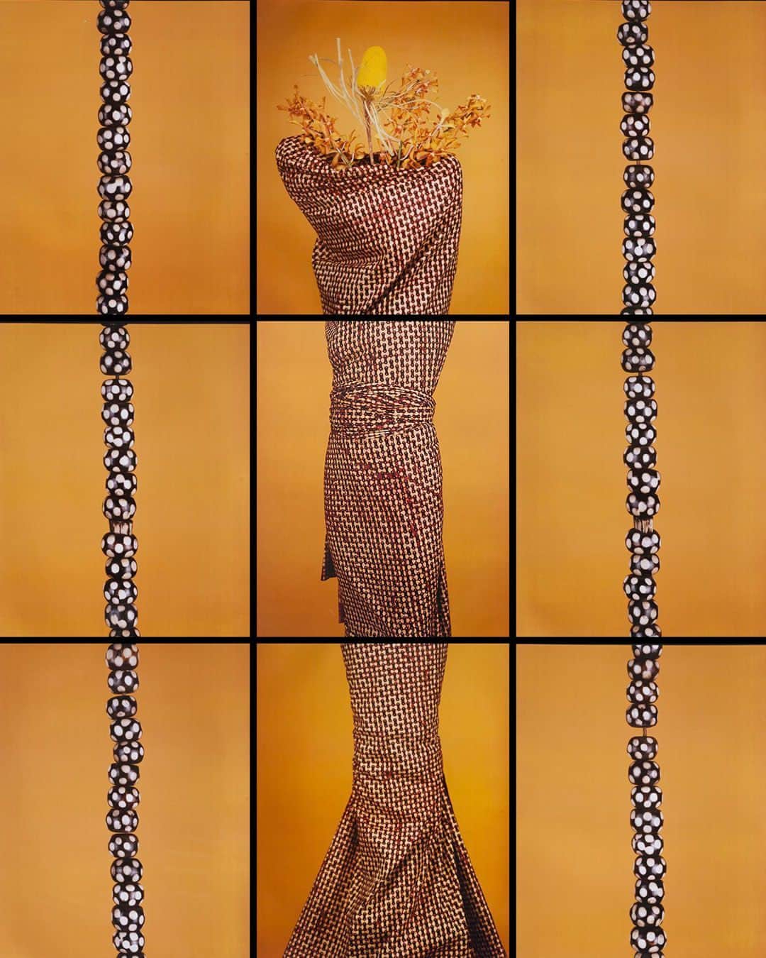 ブルックリン美術館のインスタグラム：「What do you see here? 🔍⁠ ⁠ With the lens pulled out for a wide shot, María Magdalena Campos-Pons transformed herself into an abstract offering for “Classic Creole,” shown above. ⁠ ⁠ Comprised of nine individual Polaroid photographs, Campos-Pons contrasts a border of scales and textures of zoomed-in handmade African beads with an abstracted impression of her own body, which is wrapped and hidden within patterned Senegalese fabric and sprouts an offering of orchids.⁠ ⁠ Often used to describe people with both African and European ancestry, the word “creole” in relation to this feat of photography and performance indicates the global prominence and multiplicity of African visual and spiritual culture.⁠ ⁠ 🎨 María Magdalena Campos-Pons (born Matanzas, Cuba, 1959). Classic Creole, 2003. Composition of nine Polaroid Polacolor Pro photographs, framed: 29 × 25 in. (73.7 × 63.5 cm) each. Institute of Contemporary Art, Boston; acquired through the generosity of Jodi and Hal Hess. © María Magdalena Campos-Pons. (Photo: courtesy of Gallery Wendi Norris)⁠ ⁠ #BeholdBkM #BrooklynMuseum #MariaMagdalenaCamposPons」