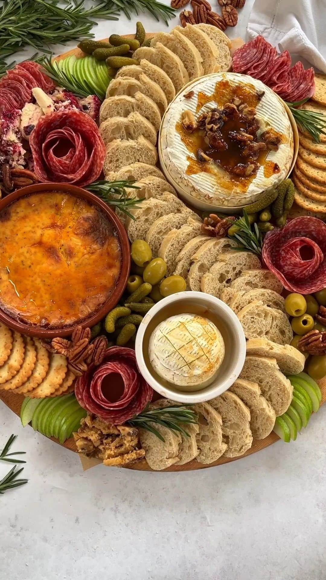 Tesco Food Officialのインスタグラム：「Check out how @tamingtwins has #BecomeMoreChristmas with this festive baked cheeseboard 🎄🧀 Head to the link in bio to shop the range.」