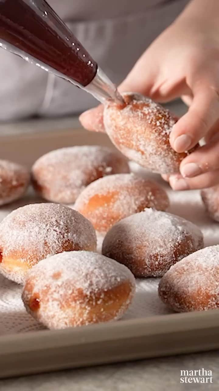 マーサ・スチュワートのインスタグラム：「Happy Hanukkah! These deep-fried delicacies are the sweetest way to celebrate the festival of lights. Plump up each doughnut with fruit jam—use your favorite flavor or a mix. For an added wintry effect, sprinkle the tops with granulated sugar. Get the full recipe at the link in our bio.」