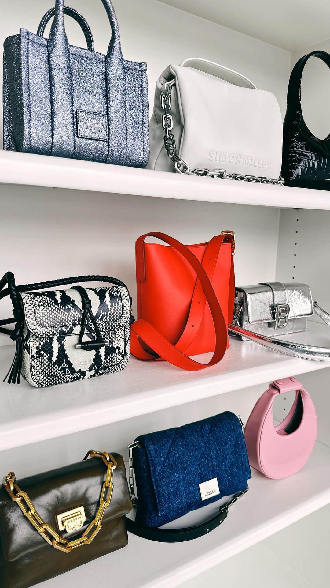 Shopbopのインスタグラム：「BAG DROP: Max-shine metallics, python prints, dreamy denim... presenting the season’s can’t-miss carryalls (spoiler alert: it’s virtually impossible to choose just one). Shop the latest from #IsabelMarant, #STAUD, #MansurGavriel & more via link in bio 🛍️」