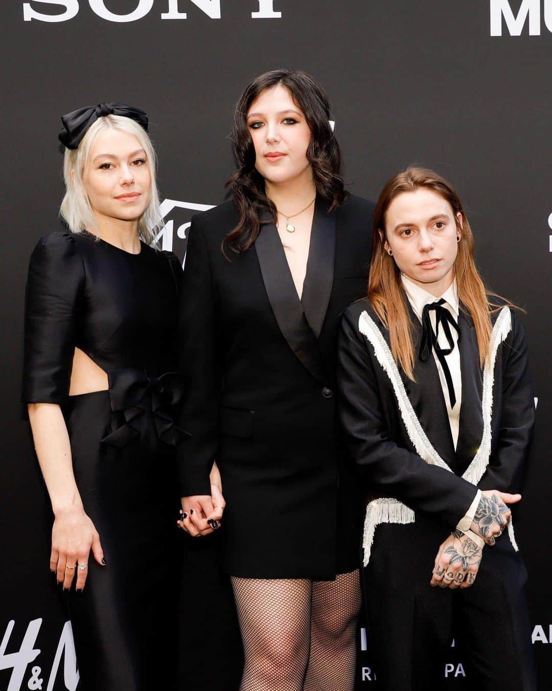 ロダルテのインスタグラム：「@julienrbaker wears Rodarte’s Black Suit with Fringe and Rhinestone Details for @variety’s Annual Hitmakers Brunch, with @xboygeniusx being honored as Group of the Year.  Styled by @lindseyhartman   #rodarte #boygenius #julienbaker #lucydacus #pheobebridgers」