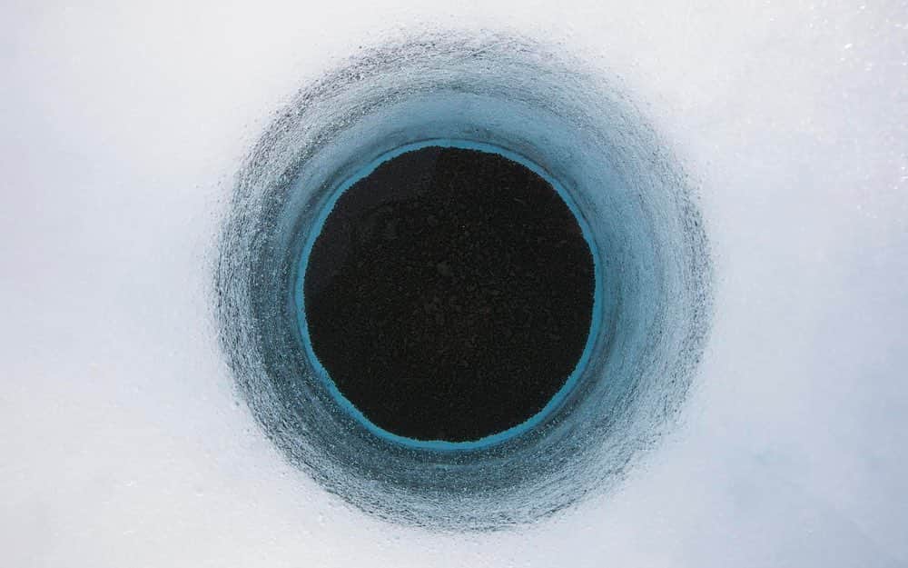 thephotosocietyのインスタグラム：「Photos by @nickcobbing  Here are four images recently printed in @bastillemagazine in France. They’re from a larger body of work about the glaciers and sea ice of the Arctic region. From a wider selection the editors picked out some more abstract pictures that show features in the ice of Greenland.  Image 1 shows a hole made by cryoconite (a mix of mineral and organic matter) where the darker material absorbs heat, gradually melting deeper into the ice.  Image 2 shows a rift (or crack) developing in a floating tongue of a glacier as it flows out over ocean water.  Image 3 shows finger shaped pieces of ice gradually freezing over a melt lake on the Greenland ice sheet.  Image 4 shows a network of crevasses in the surface of a glacier on Greenland.  #arctic #greenland #ice #climatechange #details」