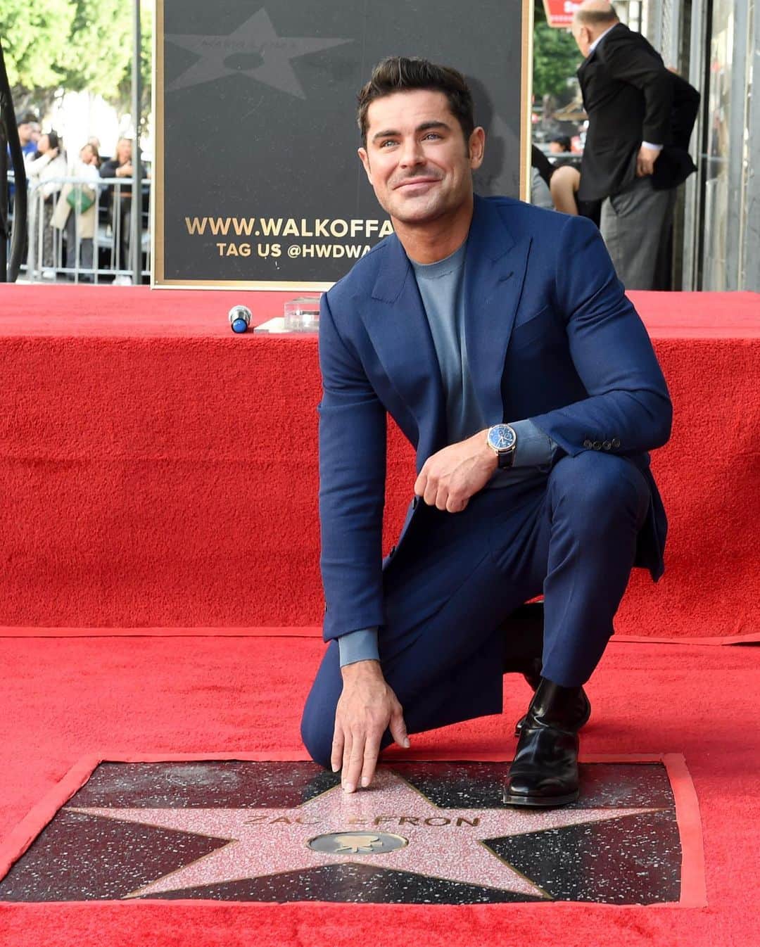 Vanity Fairのインスタグラム：「@ZacEfron has left his mark on Hollywood. The actor was honored for his work with a star on the Hollywood Walk of Fame this afternoon in Los Angeles with former costars Jeremy Allen White ('The Iron Claw') and Miles Teller ('That Awkward Moment') in attendance.  Photos: Leon Bennett/Getty Images, Gilbert Flores/Variety via Getty Images」