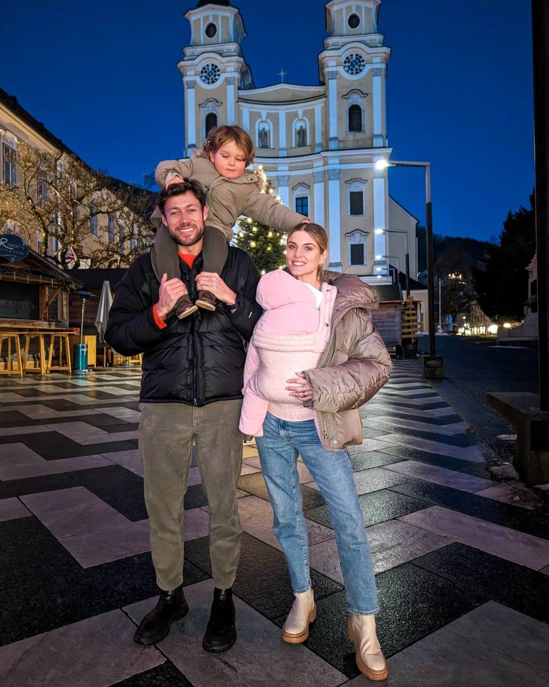 Ashley Jamesさんのインスタグラム写真 - (Ashley JamesInstagram)「Bucket list ticked off: the Sound of Music tour. 🎶❤️  What a way to end our trip to Salzburg! We're on the way back to the airport now but yesterday afternoon we did a Sound of Music tour and it was amazing! 💕🎶  Despite the film coming out in 1965, apparently the Sound of Music still attracts 300,000 tourists a year to Salzburg, which is just mind-blowing.  I've not seen the film for a while, but when I was at first school, baby Ashley would take the video in every single day hoping my teacher would let us watch it. I remember the VHS had a big plaster on with my name etched on. After a while my teacher gave in and let us watch it and asked me not to bring it back again. So I started bringing the tape cassette in instead. I was absolutely obsessed. I remember my mum telling me you could go to the real place and I couldn't believe it and I hoped that one day I could do it!   We saw the pavilion where they sang "16 going on 17", the church where they got married, the lake where they fell in on the boat, the path where Maria sings down, the two houses they filmed the Von Trapp home. And we learned so much about the real vom Trapp family. Our guide was so funny and amazing, and we saw so much of the Salzburg lake district which is somewhere I'd definitely want to come back in the summer. It's such a beautiful place!  And the best thing is - the littles were amazing even on a 4 hour tour! We brought lots of snacks and the iPad and there were lots of stops along the way!  What a beautiful place to come to for Nana's special birthday. And now it's back to reality to the work rush before we get to enjoy Christmas.   If anyone has any questions about our trip I'd be very happy to try and answer. ❤️✨🙏🏼」12月12日 19時26分 - ashleylouisejames