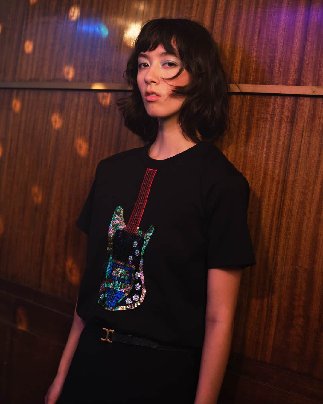 Chloéのインスタグラム：「The multicoloured sequins, rhinestones and beads that form the shape of an electric guitar on the t-shirt in lower-impact cotton jersey are a tribute to the mesmerising designs Karl Lagerfeld sent down the runway at his Autumn-Winter 1983 show for Chloé.」