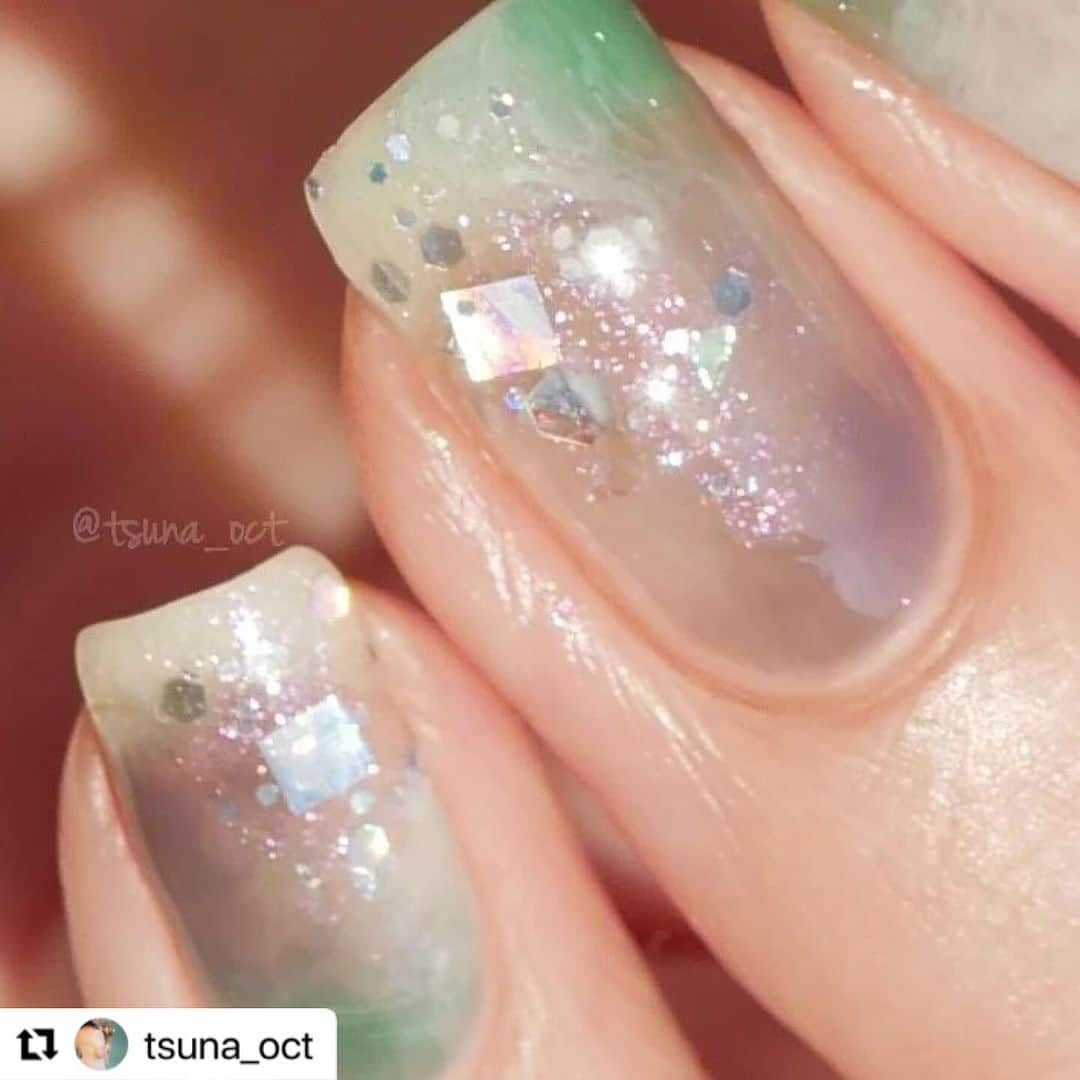 【PLANET NAIL（プラネット ネイル）】公式さんのインスタグラム写真 - (【PLANET NAIL（プラネット ネイル）】公式Instagram)「✰✰✰✰✰✰✰✰✰✰ PLANET Girl🪐 @tsuna_oct さま♡  待ってましたなつみちゃん🥺✨ タグ付けがうまくいかず見落としちゃって こんな最高にかわゆいデザインが 埋もれていたなんて😮‍💨🩷🩷  新色ミルキーウェイをつかった なつみちゃんと言えばブルー＆グリーンを かけ合わせたつやっつやな指先✨✨✨ ぜひぜひみなさままねっこしちゃってください🩷 ╍ ╍ ╍ ╍ ╍ ╍ ╍ ╍ ╍ ╍ ╍ ╍ ╍ ╍ ╍ ╍  ・・・ 💅🏻💅🏻⁡ ⁡.⁡ ⁡⁡ ⁡ #プラネットネイル 新色✨✨⁡ ⁡本日ロフト先行発売開始💭⁡ .⁡ ⁡⁡ ⁡2色発売された中から、 #ミルキーウェイの羅針盤 を使ったデザインです🫧⁡ ⁡繊細なピンクパールと、大小・六角と四角のシルバーラメ、オーロラクラッシュホロが入ったTheプラネットネイルなカラー！！💓⁡ ⁡.⁡ ⁡パープルやピンクと合わせても可愛いですが、今回はブルー×グリーンと合わせてみました💙💚⁡ ⁡.⁡ ⁡⁡ ⁡キラッキラ可愛いカラーなので、シアーカラーとは相性抜群！⁡ ⁡じゅわっと溶け合い、キラキラのアクセントをつけてくれます🥹👏🏻👏🏻⁡ ⁡.⁡ ⁡⁡ ⁡使用品は、⁡ ⁡・@planet.jp ⁡ ⁡ #planetnail ミルキーウェイの羅針盤⁡ ⁡・@smelly.jp ⁡ ⁡ #スメリーネイル シアーペッパー シアーグラス スナメリ⁡ ⁡です🙌🏻🙌🏻⁡ ⁡.⁡ ⁡⁡ ⁡ほぼグレーに近いシアーブルーと、鮮やかめグリーン、どうかな...？って思ったけど相性抜群でした🥺🫧⁡ ⁡.⁡ ⁡⁡ ⁡⁡今回のデザイン、個人的にはめっちゃお気に入りなんやけど、好き嫌いめっちゃ分かれそう🫠🫠⁡ ⁡プラネットネイルならではの四角ホロに免じて好きって思って貰えたら嬉しいな〜(笑)🫣💓⁡ ⁡.⁡ ⁡ ⁡ ⁡ #tsuna_planetnail  #プラネットガール2023 ⁡ #ラメネイル部 ⁡.⁡ ⁡⁡ ⁡ #tsuna_bluenail  #tsuna_naildesign  #きらきらネイル  #キラキラネイル  #ニュアンスネイル  #もやもやネイル  #簡単ネイル  #シアーカラーネイル  #プチプラネイル  #セルフネイル  #ポリッシュネイル  #ポリッシュ派  #スメリーネイル部  #スメリー  #smelly  #ネイル新作  #新作コスメ  #ブルーネイル  #Selfnail  #冬ネイル2024  #polishnails  #winternails」12月13日 9時25分 - planet.jp