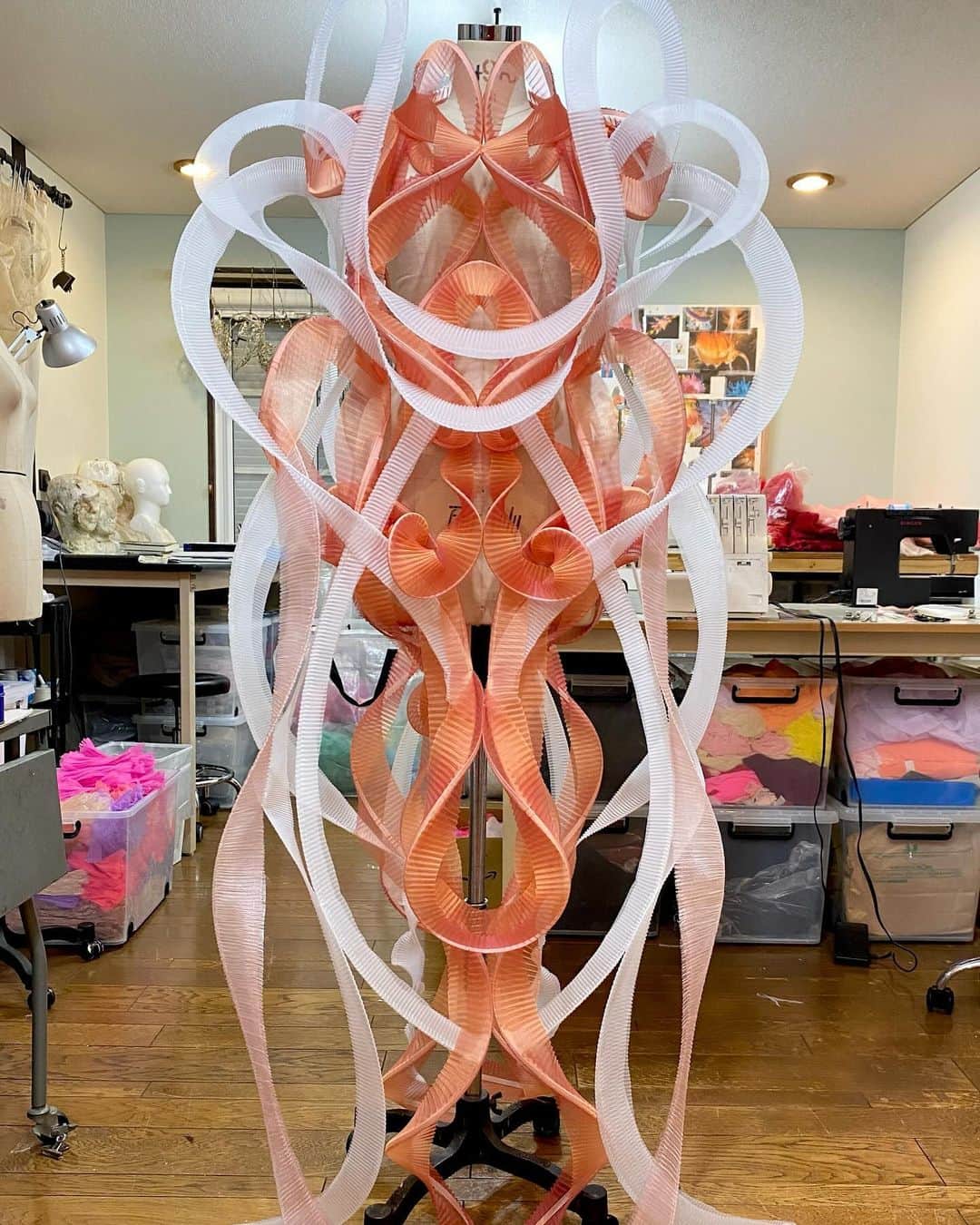 ARAKI SHIROのインスタグラム：「-spiral costume making/coral×white ver.- The custom-made costume would be all constructed with the spiral pleated parts. I am really interested in the process of controlling spiral details into organic shapes.  #ARAKISHIRO  #emergingdesigner #upnextdesigner #emergingfashion #conceptualfashion #upcomingdesigner #sculptural」
