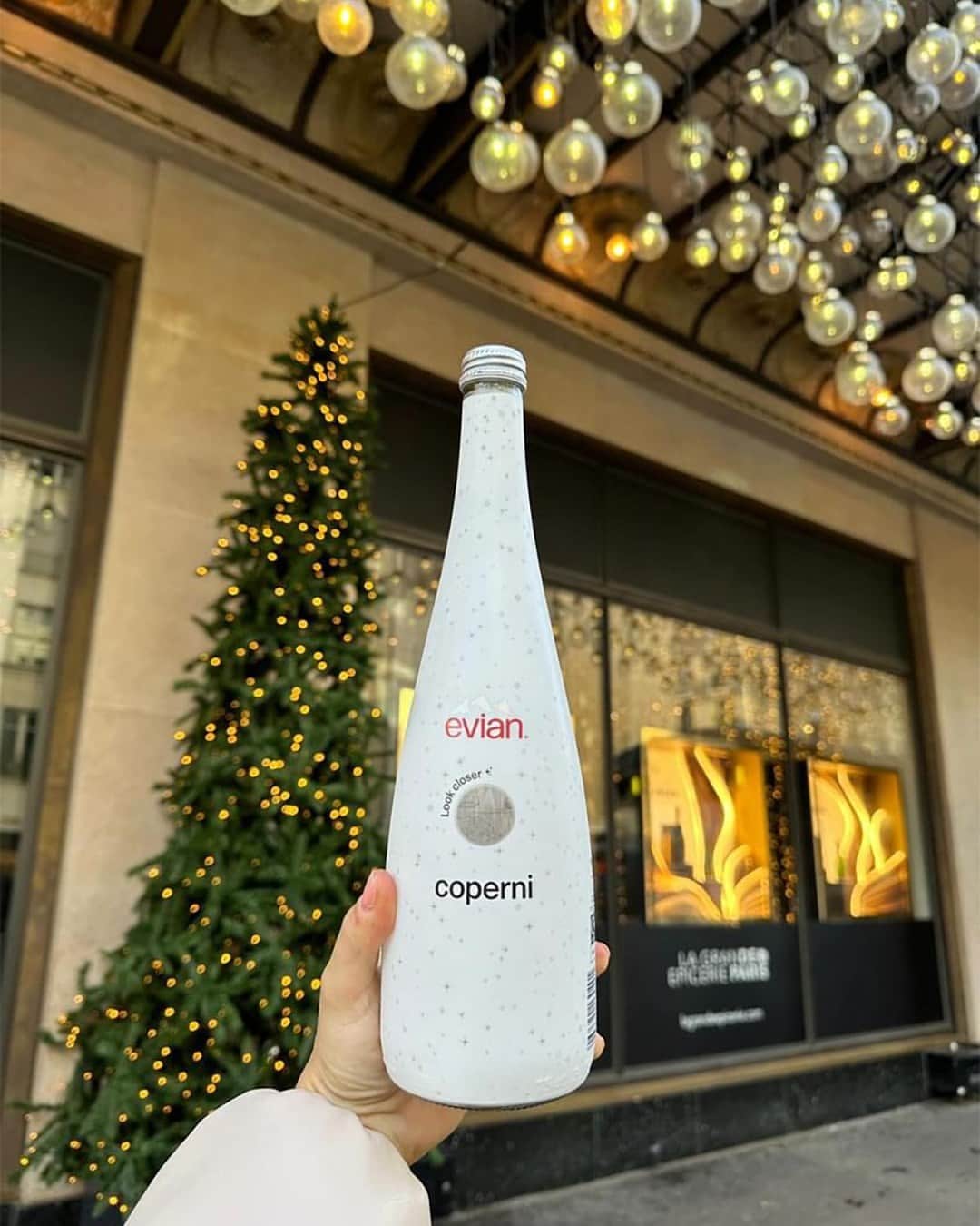 evianのインスタグラム：「#LookCloser discover the perfect gift for the festive season. ​  The Limited Edition #evianxCoperni bottle is available at @LaGrandeEpicerie @Selfridges and more. See bio link for purchase details. ​   📸 @moretto_86 ​@sarabaronati  #LiveYoung」