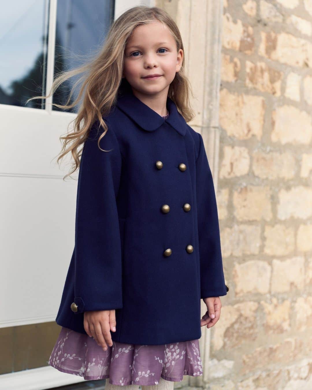 ローラアシュレイのインスタグラム：「Heading out for a Boxing Day walk? ⁣ ⁣ Keep the little ones wrapped up warm in style with our pretty peacoat. Made from a wool blend, this charming coat features an A-line silhouette with front pockets and gold button hardware.⁣ ⁣ Now available on lauraashley.com and @nextofficial」