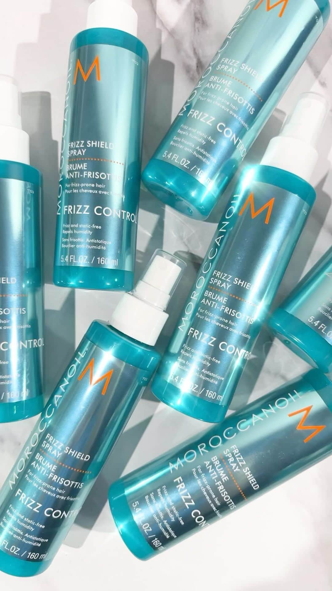 Moroccanoilのインスタグラム：「Glass hair enclosed. ✨ Frizz Shield Spray weightlessly repels humidity and leaves hair soft and shiny with a silky (never sticky) finish.」