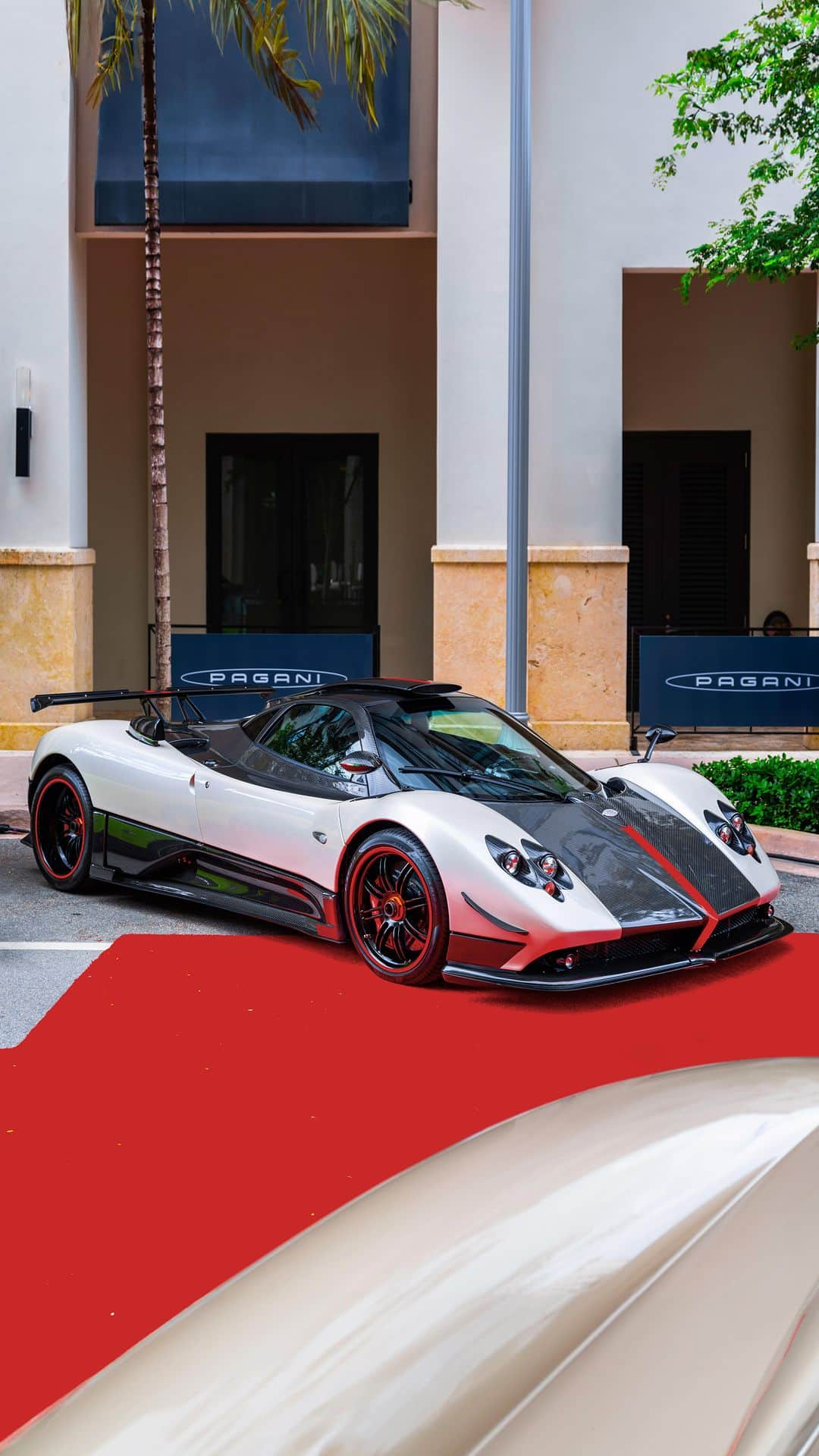 パガーニ・アウトモビリのインスタグラム：「We cannot believe it has been more than a month since the opening of our new American Headquarters in Coral Gables, Florida.  A piece of our Atelier crossing the ocean to reach a continent that has always welcomed Horacio Pagani’s visions with confidence and enthusiasm.  Relive the ribbon-cutting ceremony with us and get ready to admire an incredible parade of twenty Pagani among the rarest in the world.  #Pagani #PaganiAutomobili」