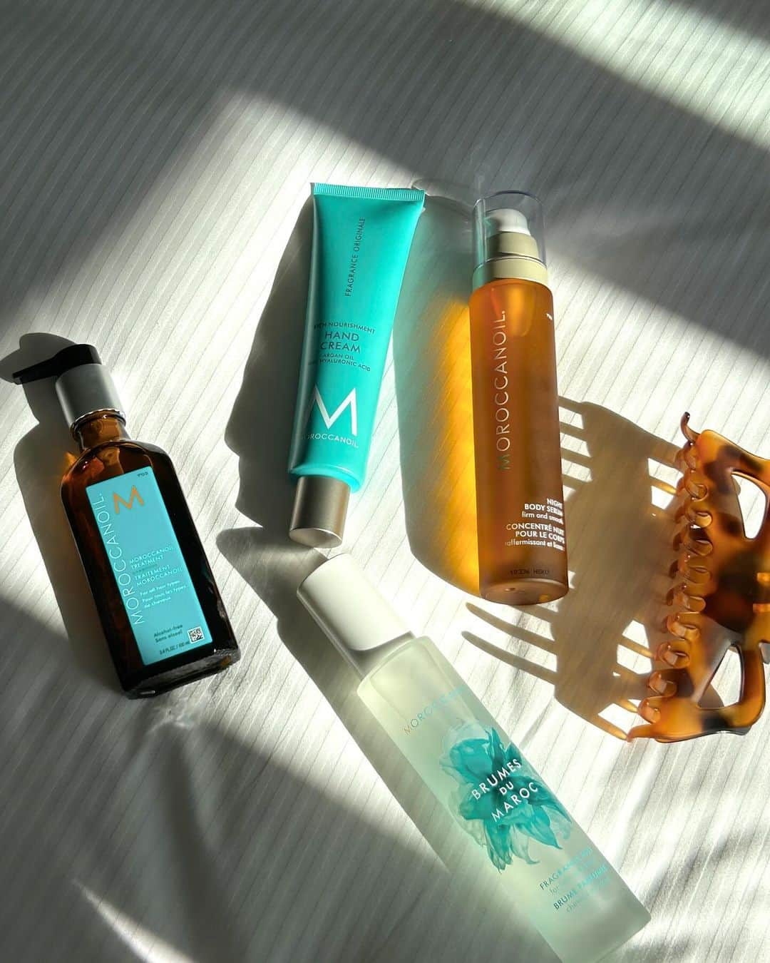 Moroccanoilのインスタグラム：「Noticing lots of new followers around here 👋 so we thought we’d do a little meet and greet with four of our top sellers!    💙 Moroccanoil Treatment: The product that started it all. A multitasking, argan oil-infused formula that boosts shine, smooths frizz and flyaways, conditions, detangles, and more!   💙 Hair & Body Fragrance Mist: Our most-requested product of all time. Featuring our iconic signature scent, a Mediterranean-inspired blend of spicy amber and sweet floral notes!   💙 Night Body Serum: Like skincare for your body. Packed with high-performing ingredients to help firm, nourish, and smooth skin while you sleep!   💙 Hand Cream: Formulated with hyaluronic acid, squalane, and argan oil to keep hands hydrated (and never greasy) through winter and beyond.   Longtime Moroccanoil lover? Share your personal favorites in the comments!」