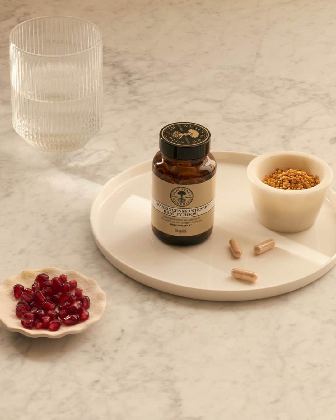 Neal's Yard Remediesのインスタグラム：「Unlock your natural radiance with our Frankincense Intense Beauty Boost supplement. 🌟⁠ ⁠ Help give your body the boost it needs with:⁠ ⁠ ✨ Biotin: Supports normal skin and mucous membranes.⁠ ✨ Vitamin C and Selenium: Shield cells from oxidative stress.⁠ ✨ Vitamin C: Aids in collagen formation for skin function.⁠ ✨ Zinc: Maintains normal skin, hair, and nails.⁠ ✨ Copper: Promotes normal skin pigmentation.⁠ ✨ Selenium: Sustains normal hair and nails.⁠ ⁠ Simply take two capsules daily, or as directed by a healthcare practitioner, preferably with a meal.⁠」