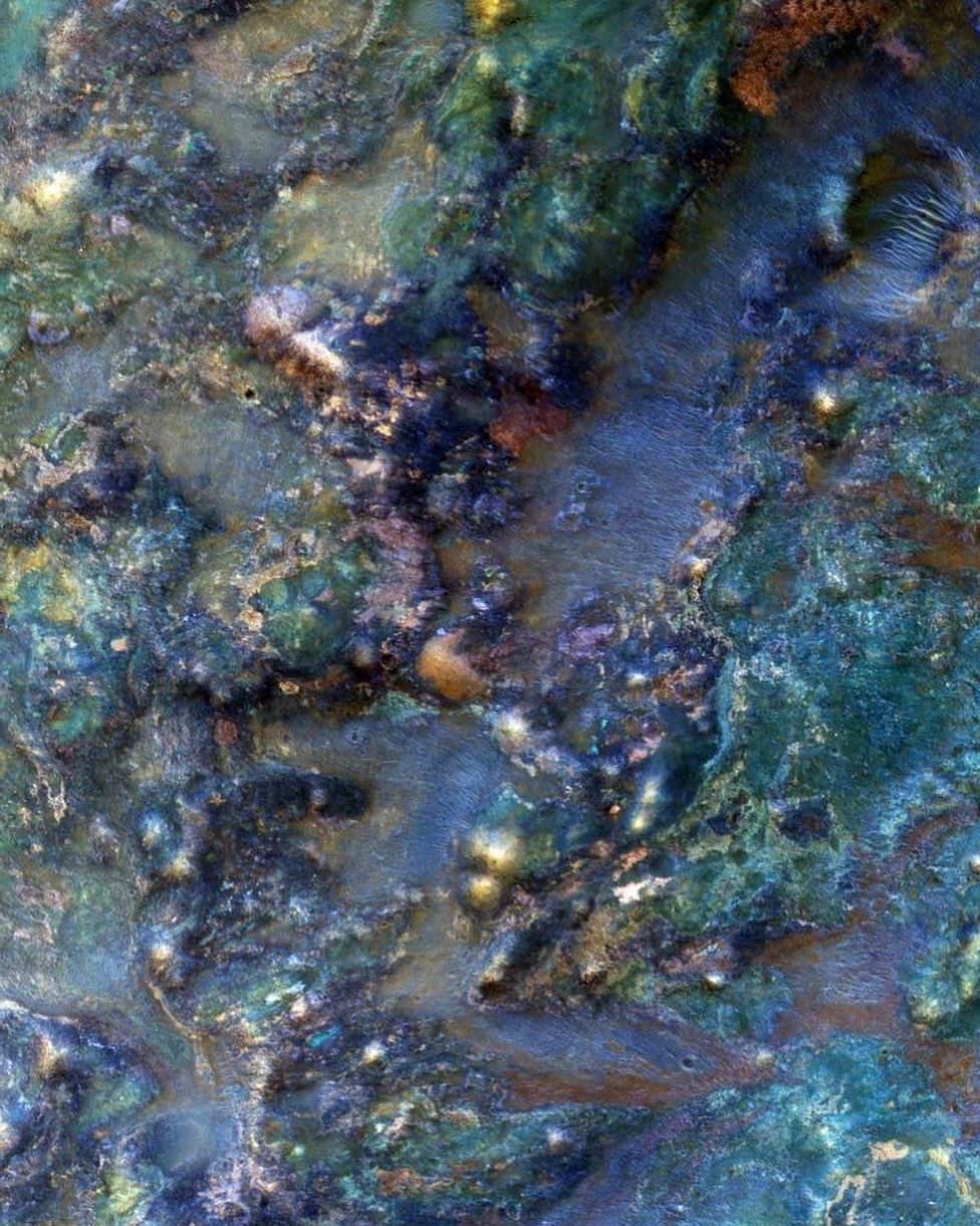 NASAさんのインスタグラム写真 - (NASAInstagram)「Can you guess what planet is home to this multicolored terrain?  This enhanced-color image shows rocky material thrown out of an impact crater when it was made. The impact broke up already diverse rock types and mixed them together to create this wild jumble of colors, each representing a different type of rock.  Credit: NASA/JPL-Caltech/University of Arizona  #NASA #Space #SolarSystem #SpaceExploration」5月16日 2時26分 - nasa