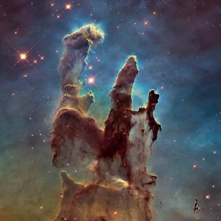 TED Talksのインスタグラム：「This past April marked the 30th anniversary of the Hubble Space Telescope (@nasahubble ) going into orbit. Since its launch, it's transmitted jaw-dropping images like this one — of the Pillars of Creation, three gaseous plumes that stand 50 trillion kilometers in height — but only in black and white. That's where @NASA photo editor Zoltan Levay comes in, introducing color, clarifying details that can get lost over 6,500 light years, and showing us earthlings what's actually going on in space. "I hope the image gives people some inkling of the size, complexity and the dynamism that’s happening in a region of space like this," says Levay. Learn more about his process of creating these pictures at the link in our bio. [Images: Zoltan Levay]」